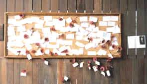 A board covered in Mamorial Cards