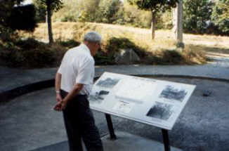 A visitor looking ant an information board on the emplacement